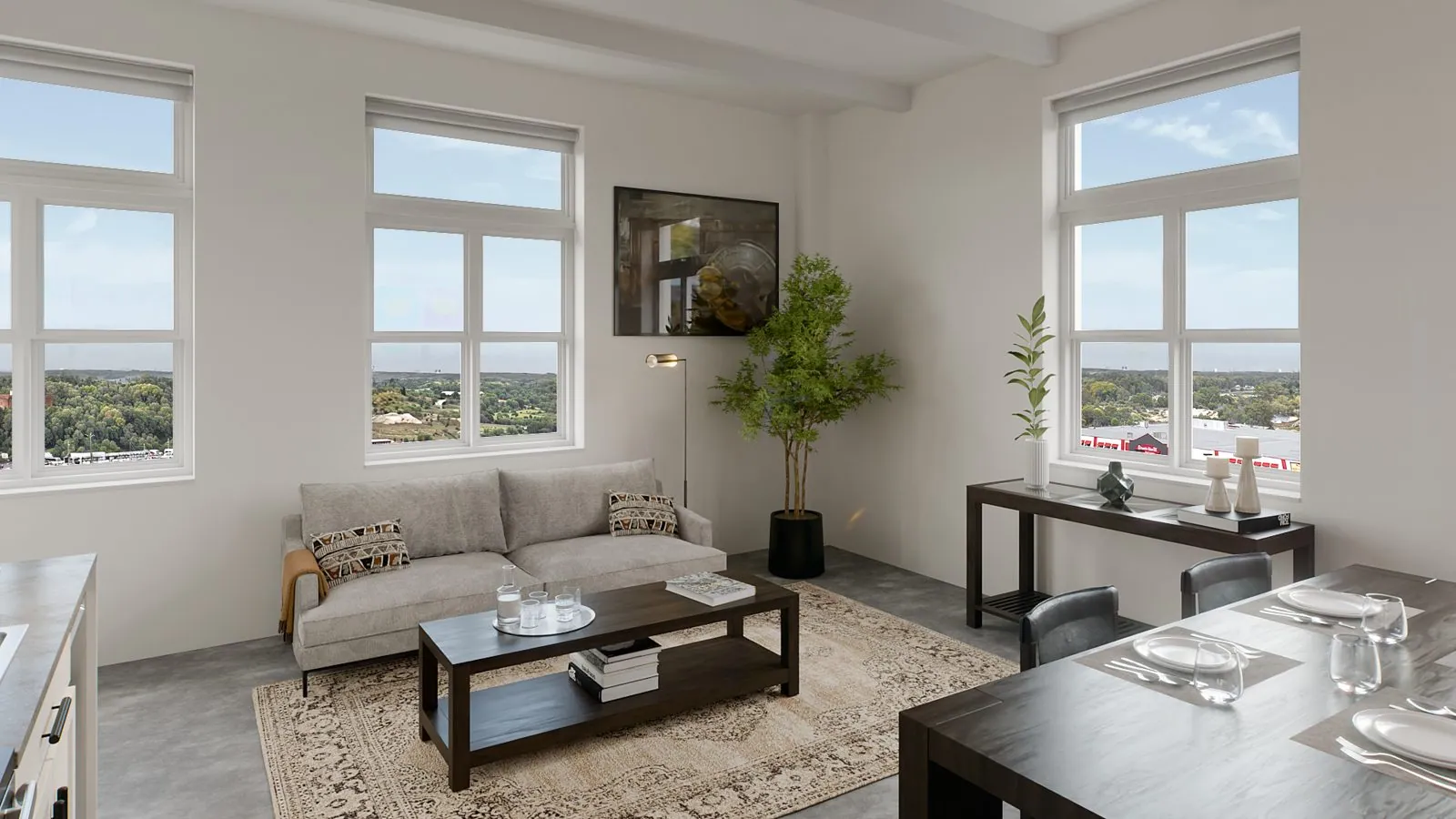 Living room with tall windows at The Banc