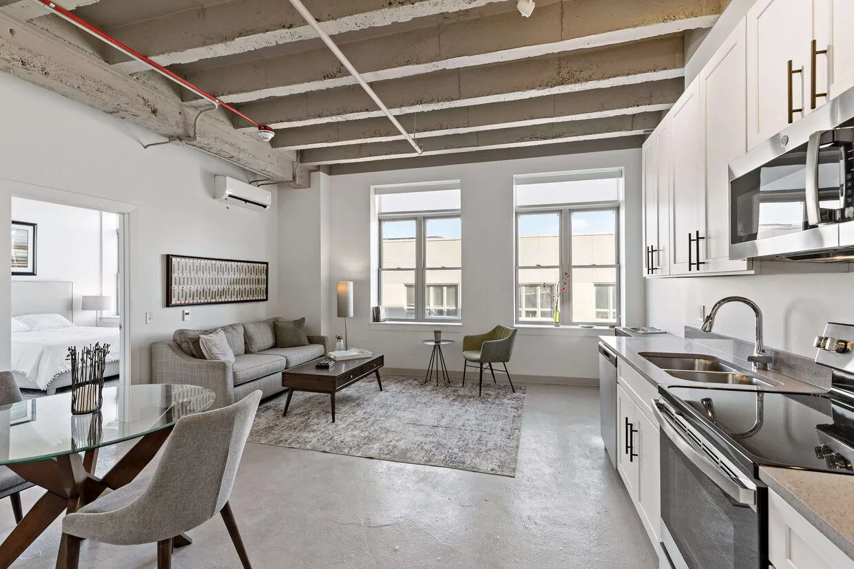 Loft apartment with exposed concrete ceiling at The Banc