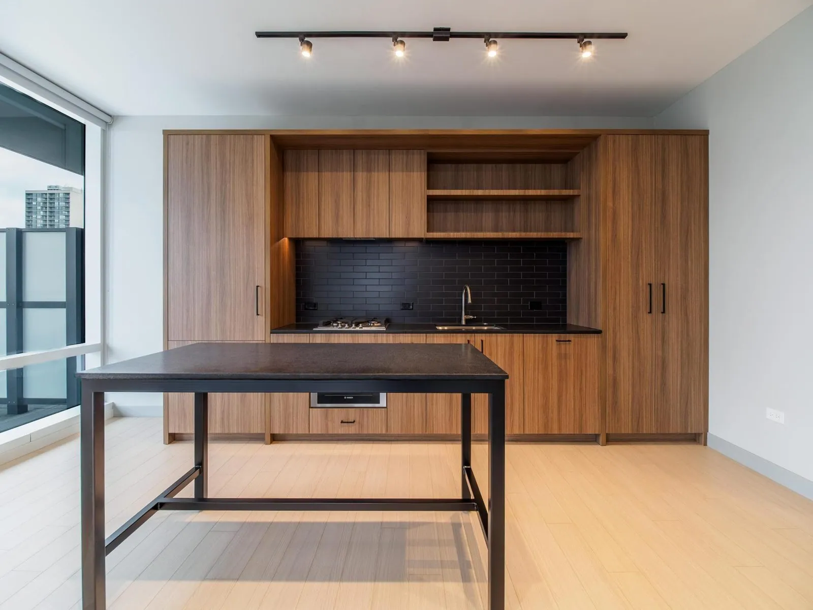 Kitchen with walnut cabinets at 920 N Wells