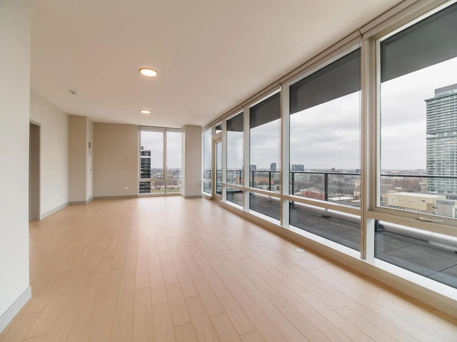 Living room with floor-to-ceiling windows at 920 N Wells